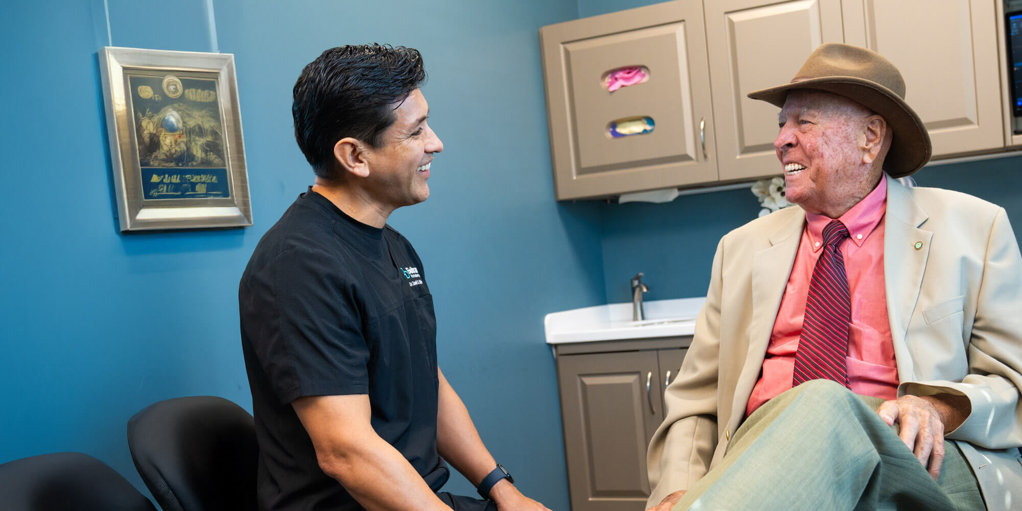 Dr. Beltran Discussing Procedure with Implants Patient Jerome